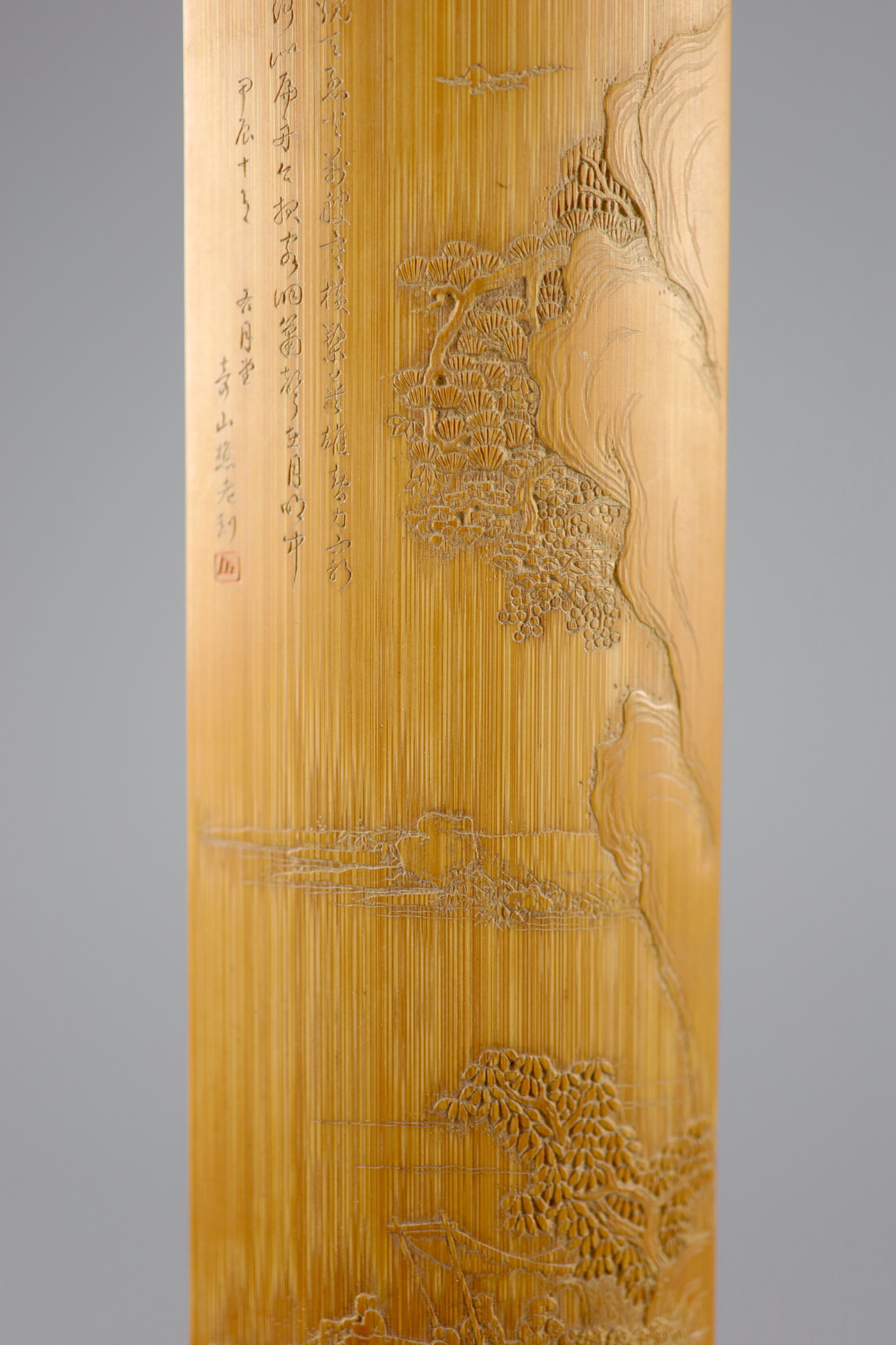 A Chinese carved bamboo wrist rest, Republic period, 22.7 cm long